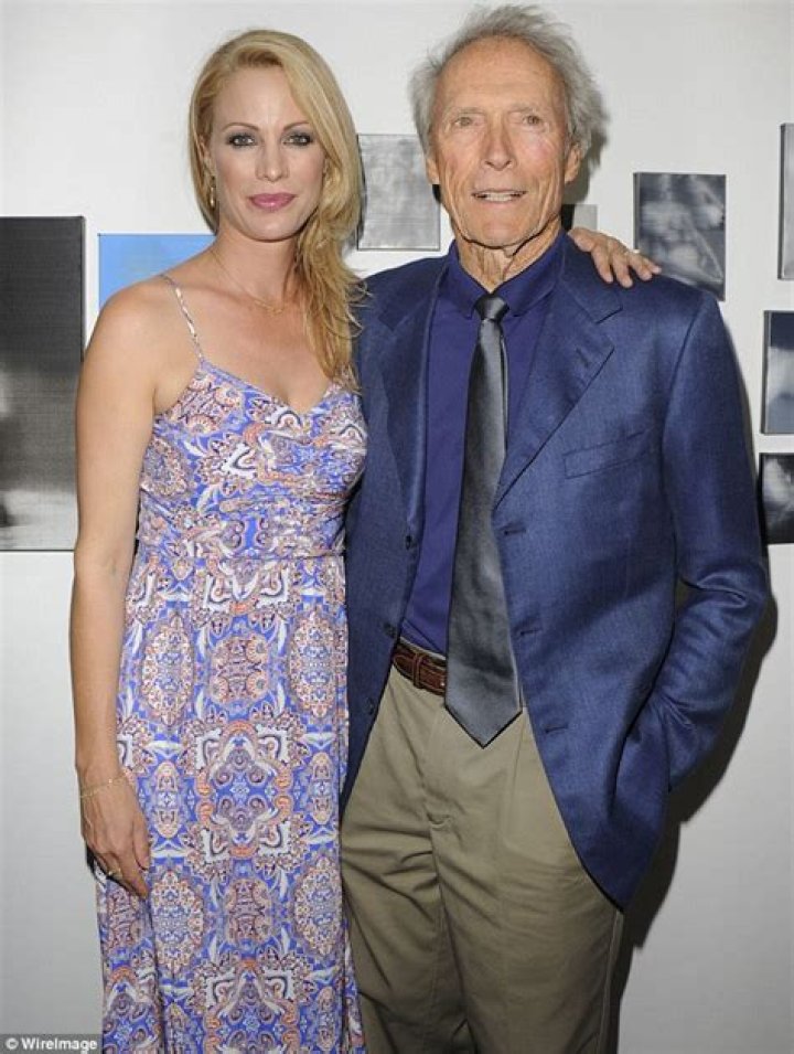 Alison Eastwood supported by father Clint and siblings Scott and