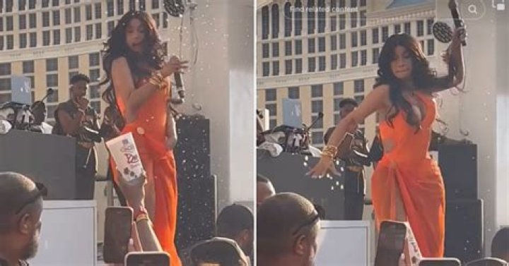 Cardi B throws a microphone at a fan who hurls a drink at her mid