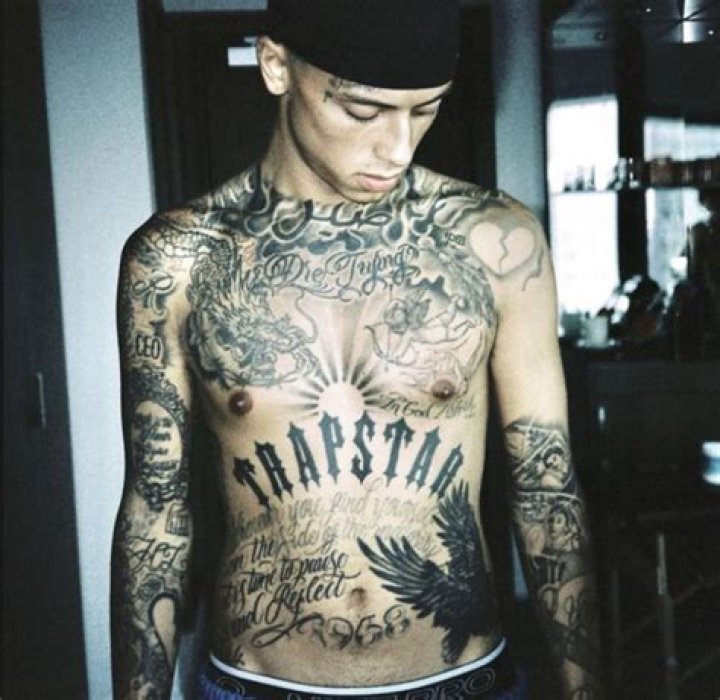 Central Cee Tummy tattoo, Tattoos for guys, Gangsta tattoos