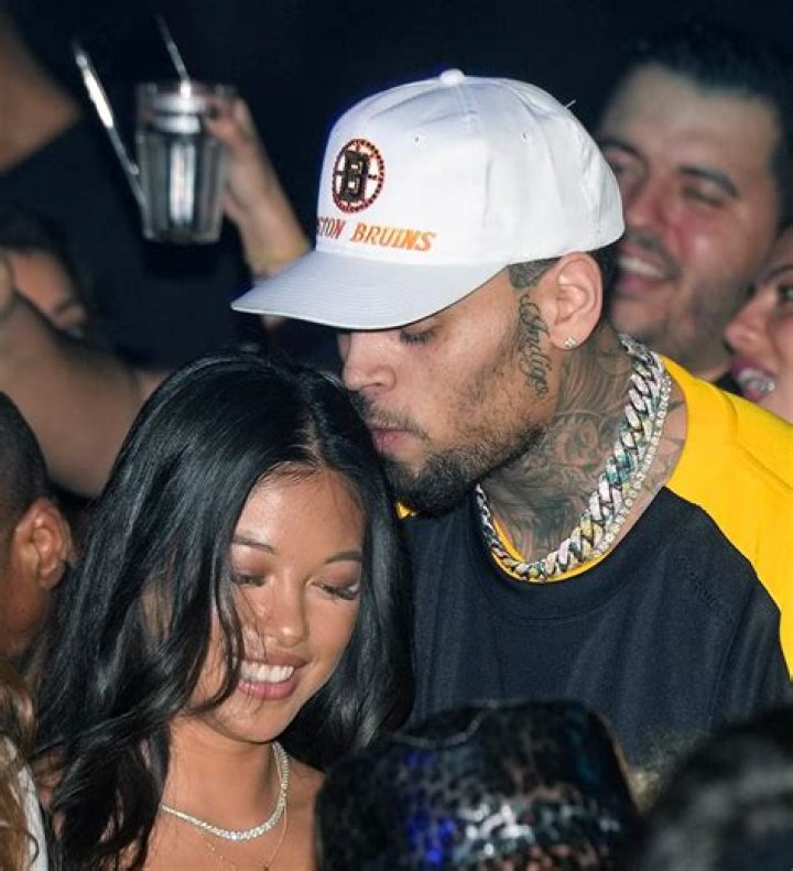 Chris Brown Cuddles Up To Baby Mama & Son In Rare Family Shot