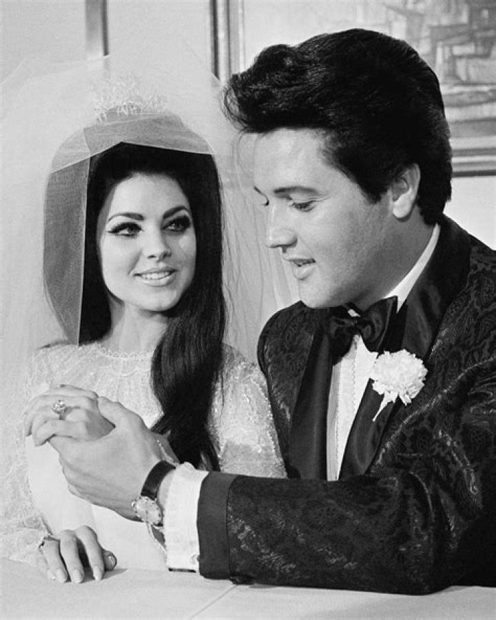 Elvis and Priscilla, bride and groom doll Elvis never left