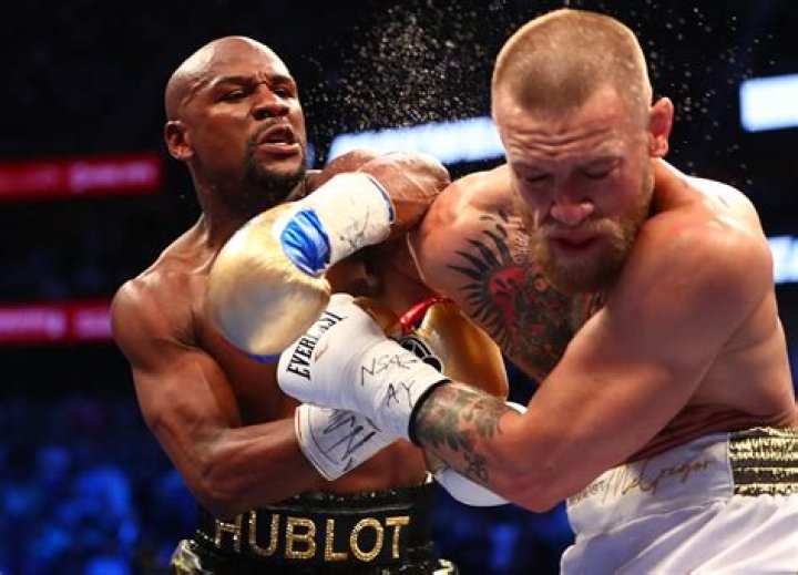 Floyd Mayweather, Conor McGregor easily make weight for big fight The