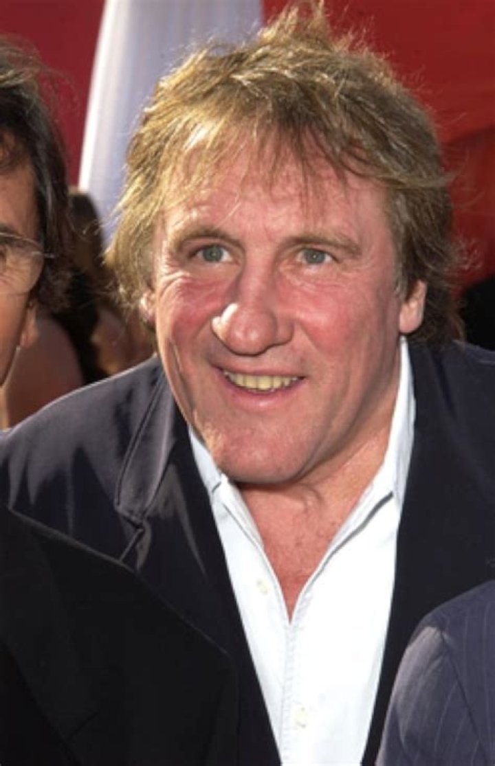 French actor Gerard Depardieu and his girlfriend Clementine Igou arrive