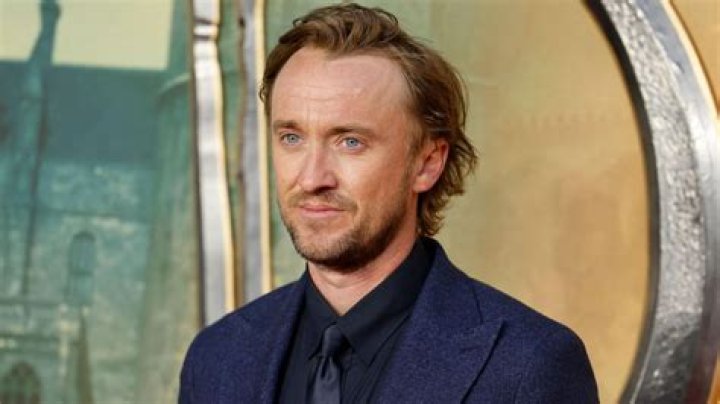 Harry Potter star Tom Felton takes his dog for a walk in London with