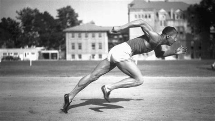 Image of Jesse Owens and his wife Minnie Ruth Solomon among the