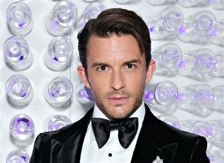 Jonathan Bailey flaunts his fashion pedigree (and jacked muscles) in