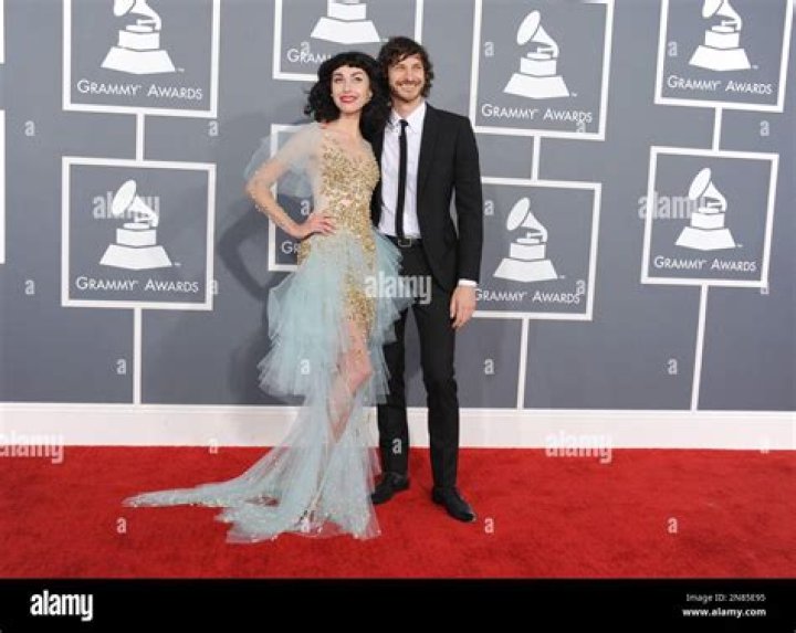 Kimbra, left, and Gotye arrive at the 55th annual Grammy Awards on