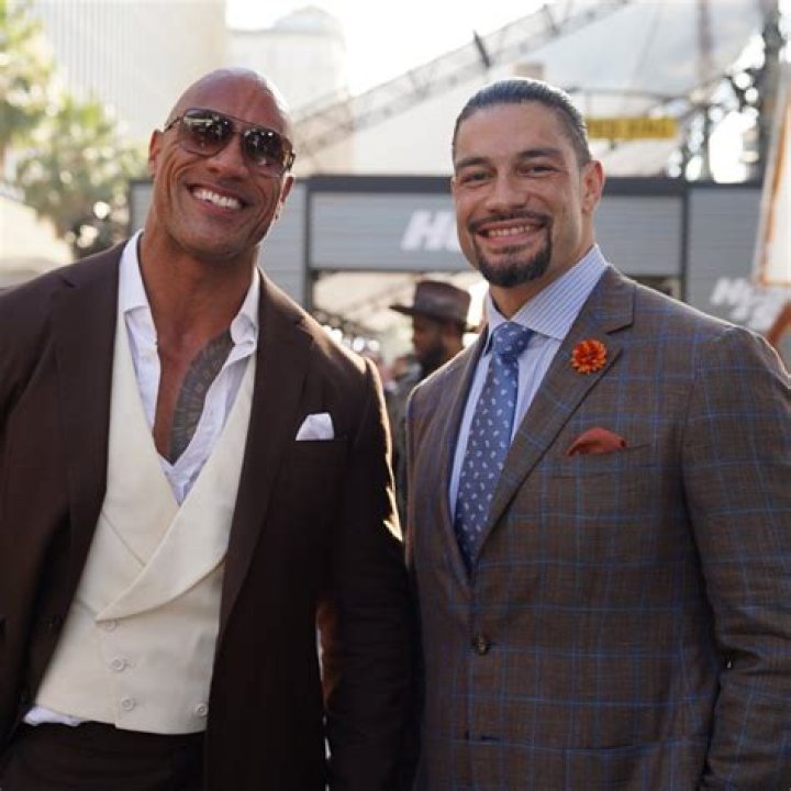 Legendary WWE Superstar The Rock (Dwayne Johnson) with his younger