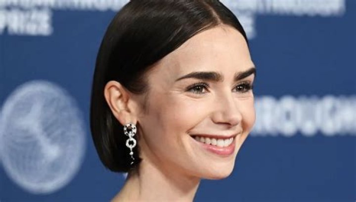 Lily Collins Reveals Her GoTo Texture Spray For Voluminous Hair