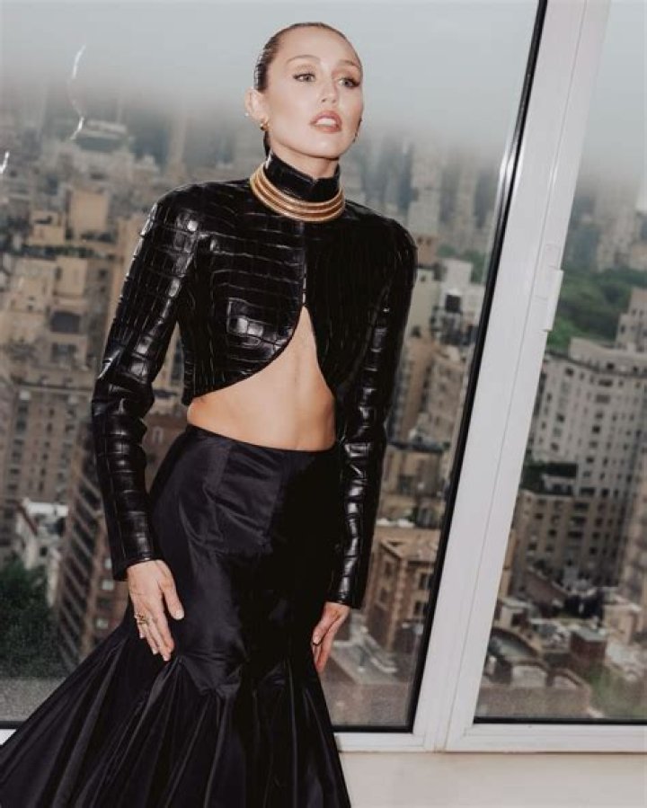Miley Cyrus wore a bold, strapless twopiece. A BikiniClad Miley