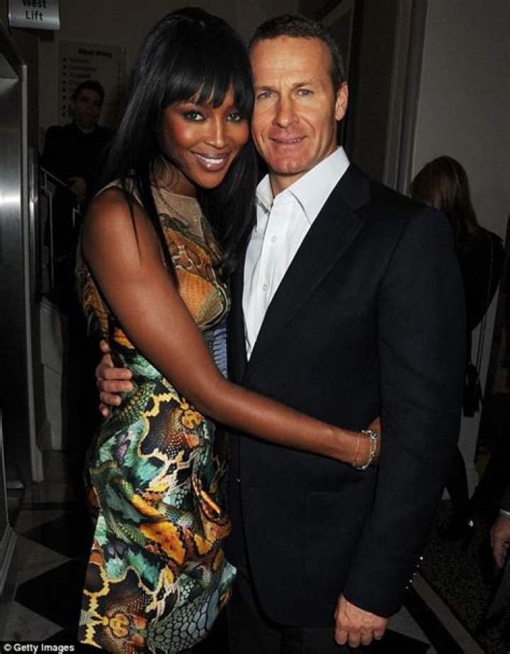 Naomi Campbell relaxes on board a yacht during sun break... amid