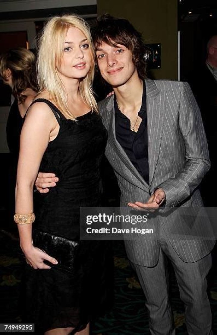 Paolo Nutini (left)and girlfriend Teri backstage at the Isle of Wight