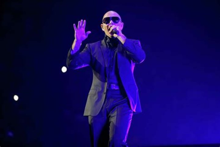 Pitbull delivers a rap show filled with energy and enthusiasm Houston