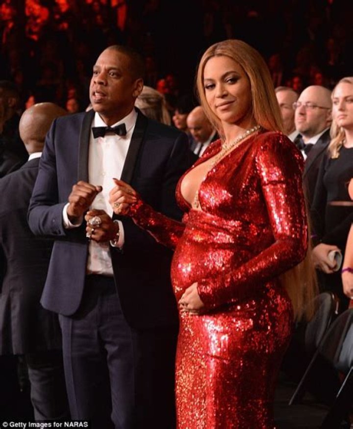 Pregnant Beyonce squeezes bump into tight dress at Grammys Daily Mail