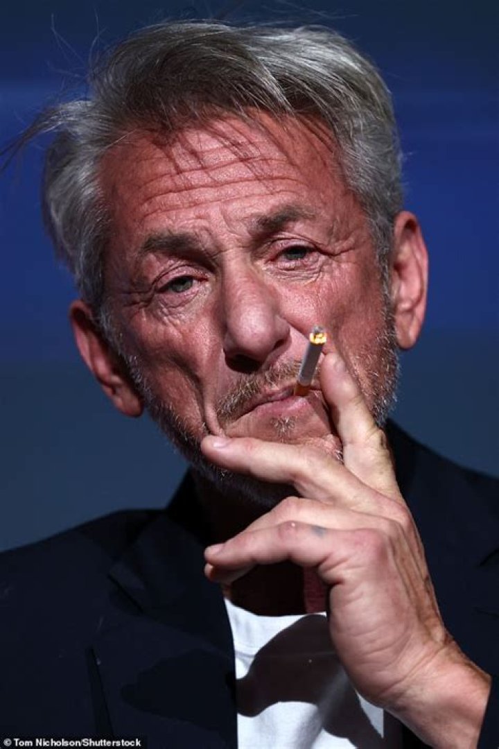 Sean Penn smokes cigarettes and says he&rsquo;s sick of acting during a