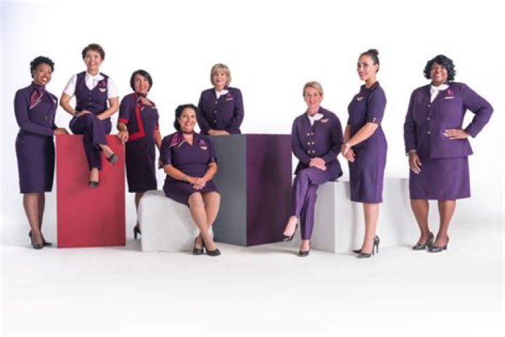 Some Delta Employees Sickened by Plum Uniforms Will Run For Miles