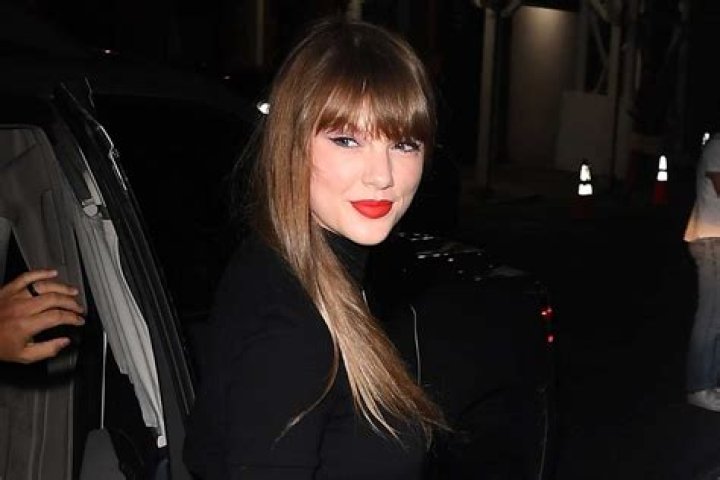 Taylor Swift Steps Out with Bigger Boobs and a Crop of Curls in NYC