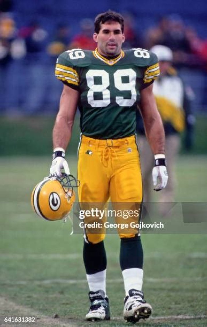 Tight end Mark Chmura of the Green Bay Packers looks on during the