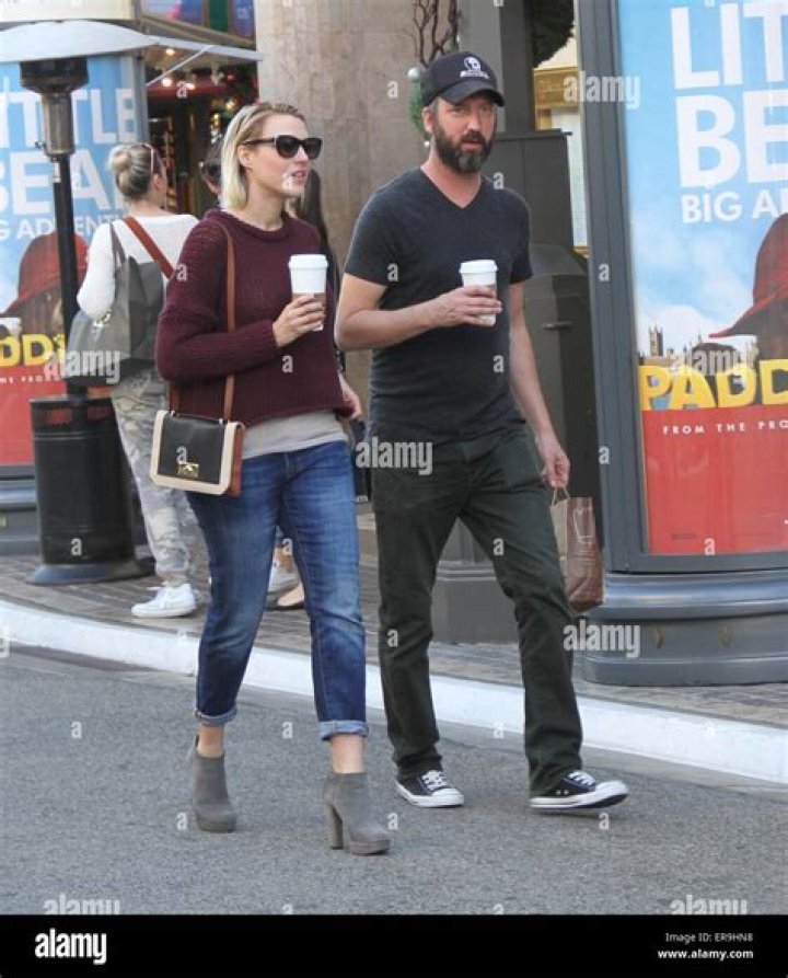 Tom Green dressed in black goes shopping at The Grove in Hollywood with