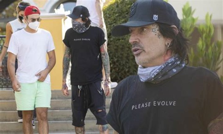 Tommy Lee steps out for dinner in LA with fiancee Brittany Furlan